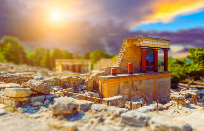 photo of the sun over the little palace of knossos