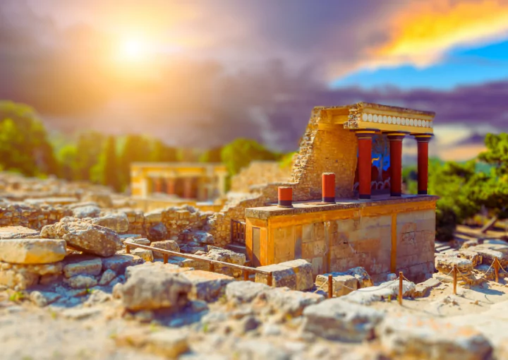 photo of the sun over the little palace of knossos